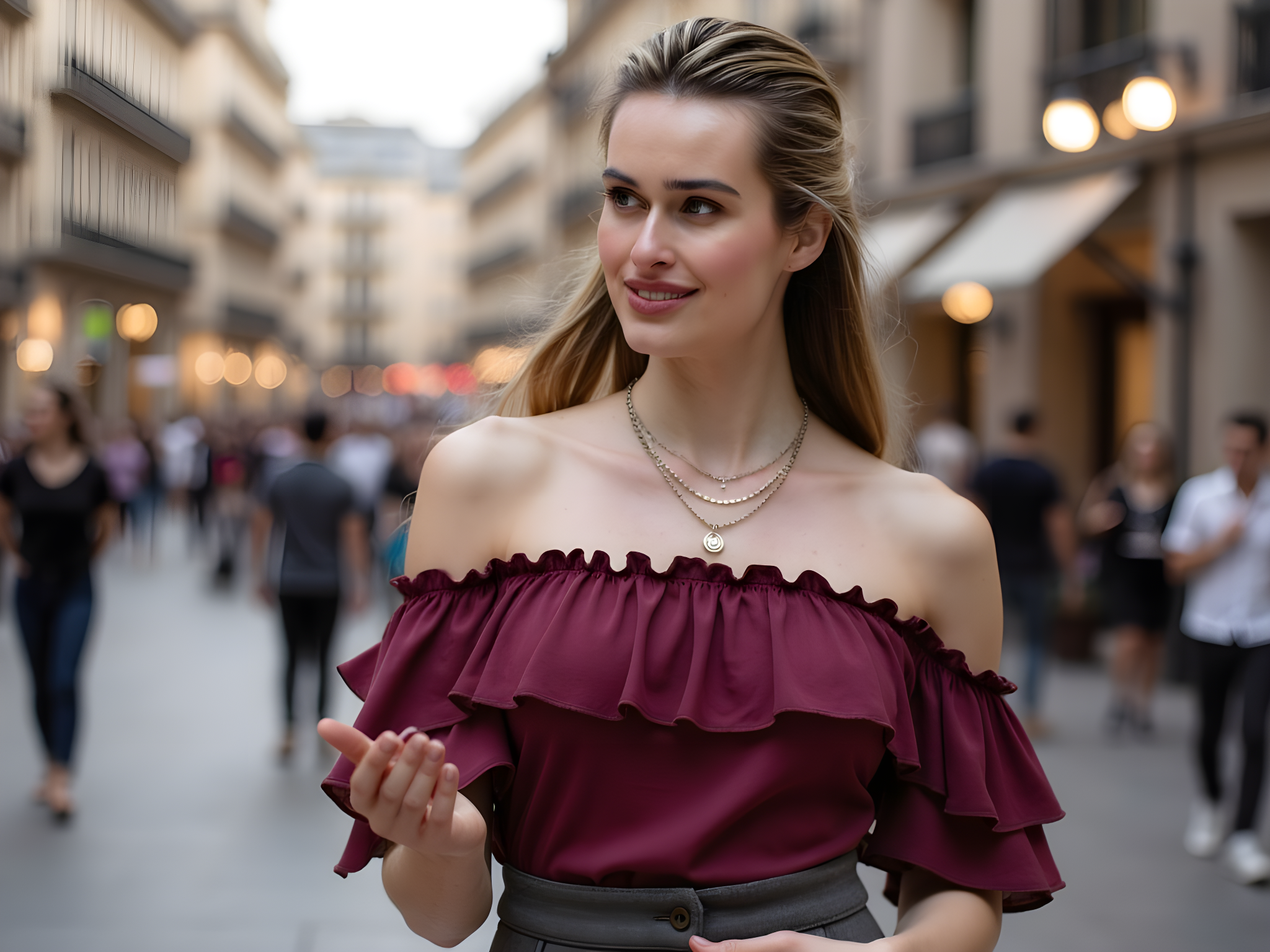A 28-year-old female model embodies the vibrant spirit of Madrid, captured against the backdrop of the bustling Plaza Mayor. She wears a bold, off-the-shoulder merlot silk blouse with cascading ruffles paired with tailored high-waisted charcoal trousers, exuding a blend of classic elegance and contemporary flair. Her layered gold necklaces playfully complement her attire, while her hair flows in loose, effortless waves that capture the essence of sun-kissed summer days. The early evening light bathes her in a warm glow, creating a chiaroscuro effect that enhances her striking features. Her pose is relaxed yet confident, one hand lightly resting on her hip, the other casually gesturing, as if inviting the viewer into the vibrant world around her. The image encapsulates the vivacity of Spanish culture, serving as a visual celebration of life, style, and the art of living beautifully in the heart of Madrid.