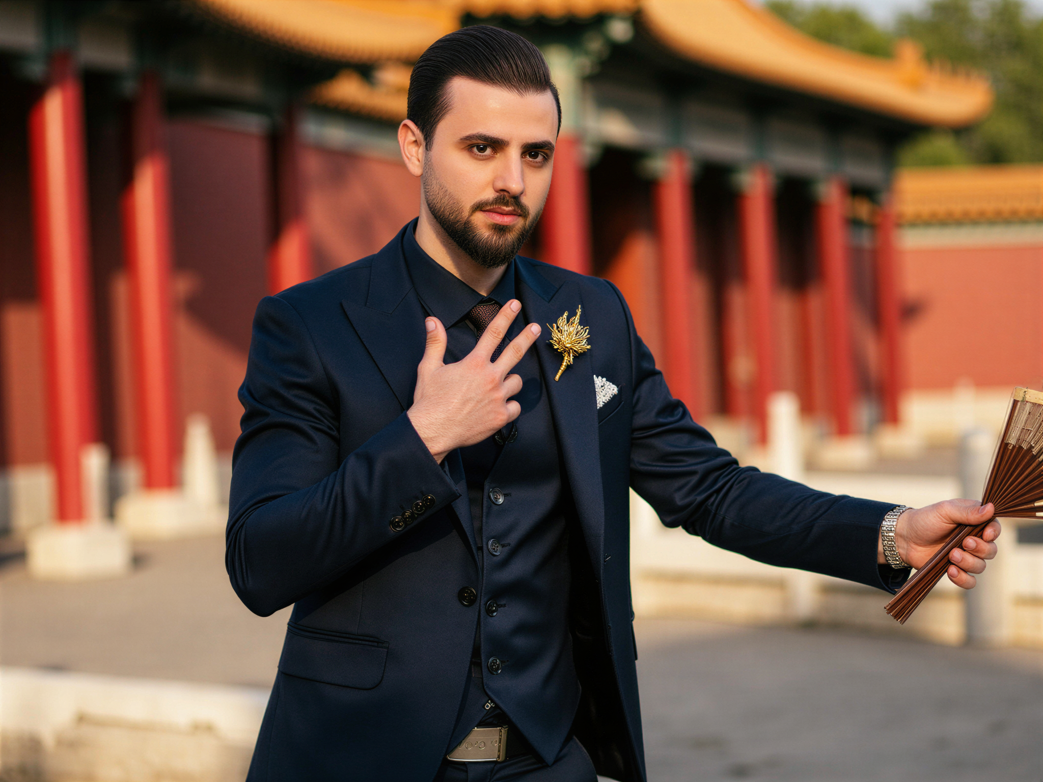 A charismatic male figure, OD62S, aged 32, exuding joy in the enchanting ambiance of the Forbidden City. He wears a tailored deep navy suit made from luxurious silk, the entourage adorned with subtle gold embroidery that reflects traditional Chinese motifs. His smile is radiant, capturing the spirit of happiness against the majestic backdrop of ancient imperial architecture, with vermilion gates and intricate roofs. The soft, warm sunlight bathes him, accentuating the rich colors of his attire and the ethereal beauty of the surroundings. The pose is dynamic, one hand gesturing as if inviting the audience to share in the moment, while the other holds a traditional fan. The composition expertly conveys a narrative of cultural appreciation and personal joy, creating a harmonious visual balance. The image captures a blend of modern elegance and historical reverence, inviting viewers to explore the layers of meaning within the scene.