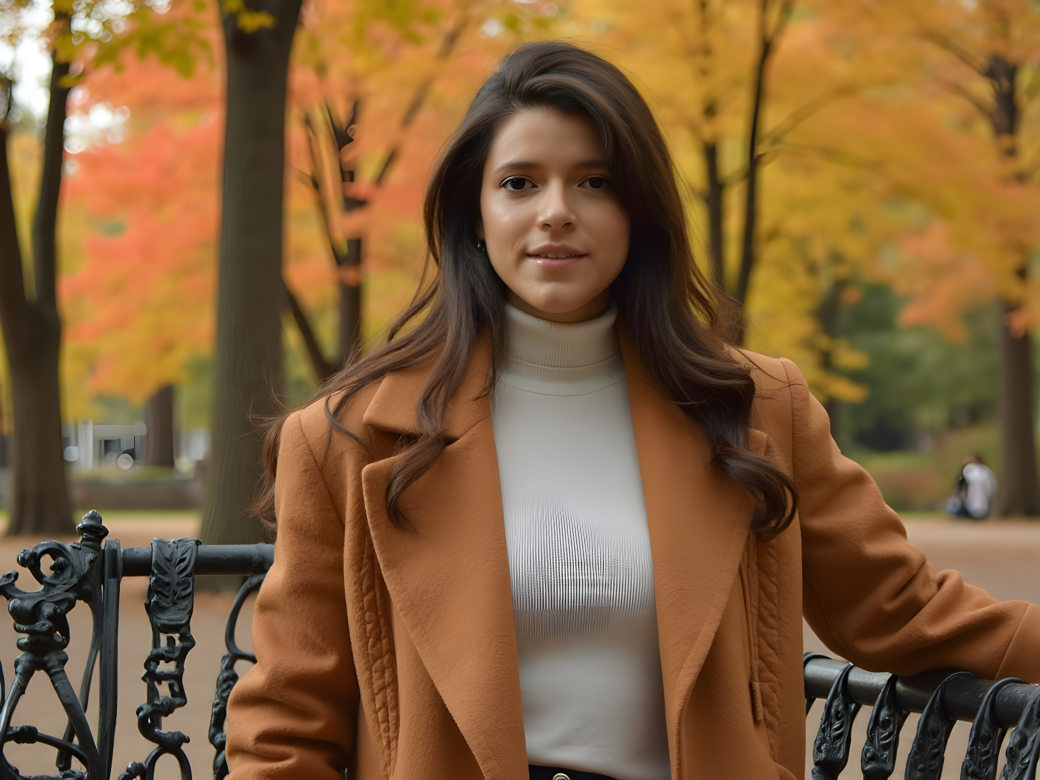 A captivating portrait of a 25-year-old woman, embodying the spirit of New York City’s Central Park in autumn. She is dressed in a luxurious, oversized auburn wool coat with intricate cable knit details, layered over a fitted ivory turtleneck and tailored charcoal trousers. Her sleek, long hair cascades in soft waves around her shoulders, framing her youthful face, which features a natural makeup look highlighting her radiant complexion. With a subtle smile, she leans against a classic wrought-iron park bench, a cascade of vibrant golden and crimson leaves swirling around her, creating a picturesque fall scene. The warm, golden hour sunlight filters through the trees, casting dappled light over the scene, enhancing the story of urban elegance and the beauty of nature interwoven. This image combines the spirit of classic New York with present-day fashion sensibility.