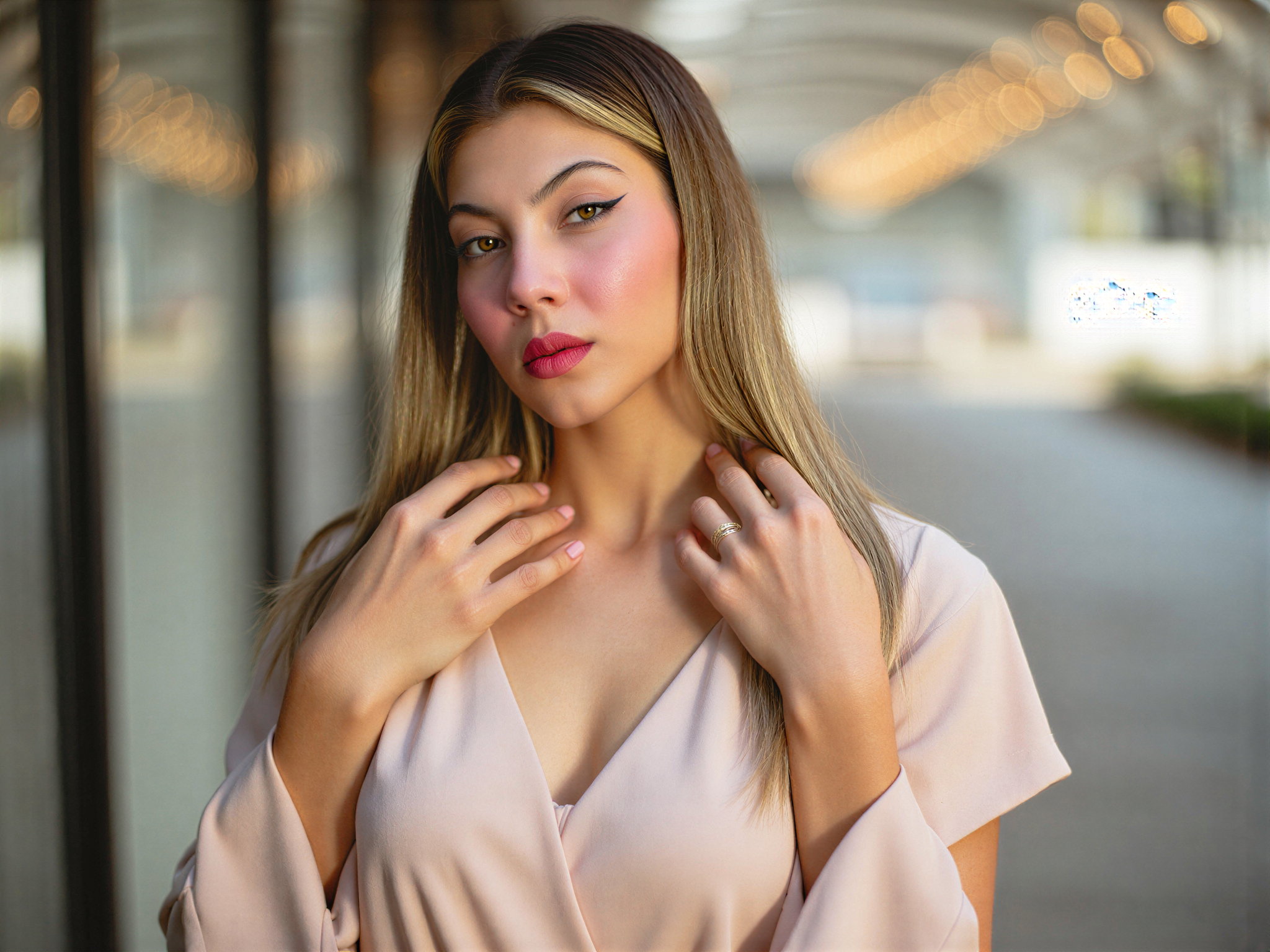 A vibrant and joyful female individual, OD62S, aged 25, exuding happiness as she poses in a contemporary setting inspired by the concept of connection and love, reminiscent of the Hinge dating app. She wears a playful pastel-colored dress with flared sleeves, accessorized with delicate gold jewelry. Her hair cascades in soft waves, framing her face. The background is a dreamy urban landscape, with softly blurred lights to create a warm atmosphere. Her radiant smile and relaxed posture capture the essence of modern romance, inviting warmth and positivity. The natural light enhances her features, creating a photogenic glow, encapsulating the spirited essence of youthful optimism in a stylish, editorial food.